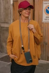 Zsinóros telefon tartó