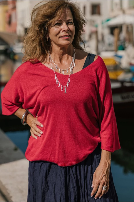 V nyakú hurkolt felső