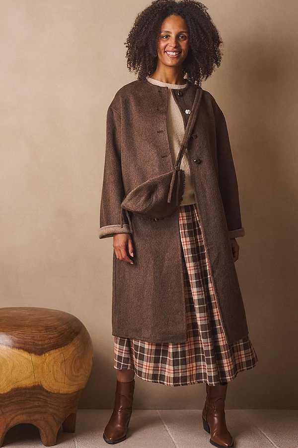 Gyapjúkabát kalappal