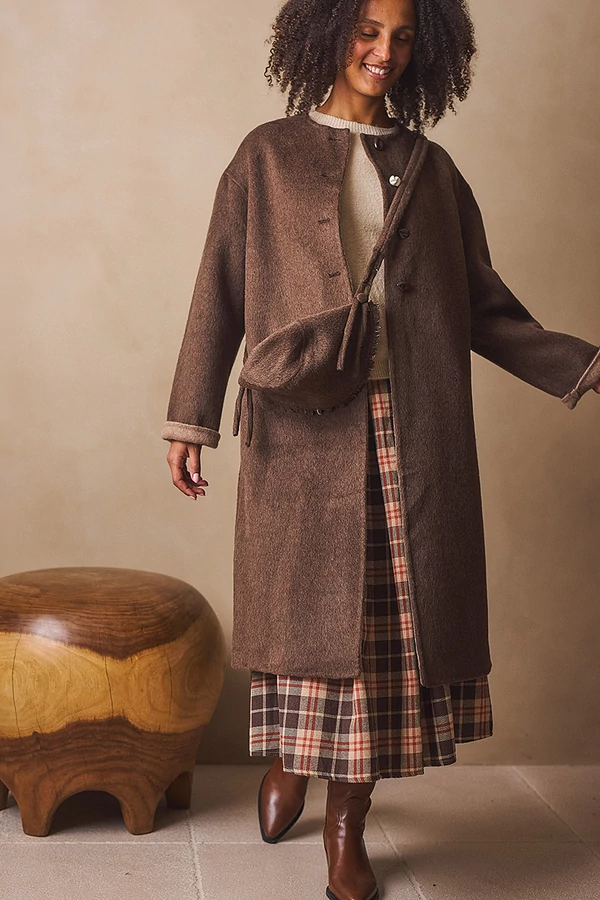 Gyapjúkabát kalappal